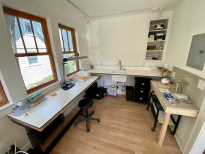 enamel bench and soldering bench with trespa countertops covered with nonflammable fiber cement board